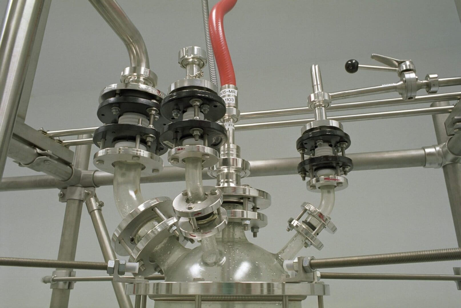 A close up of some pipes and valves on a machine